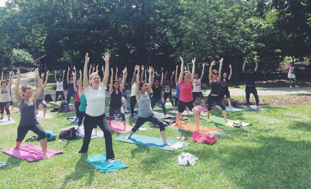 Cheap outdoor yoga classes are a thing this month in Singapore