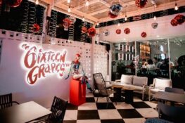 Comically large 2.5-liter glasses of wine are on offer at the new Sixteen Grapes