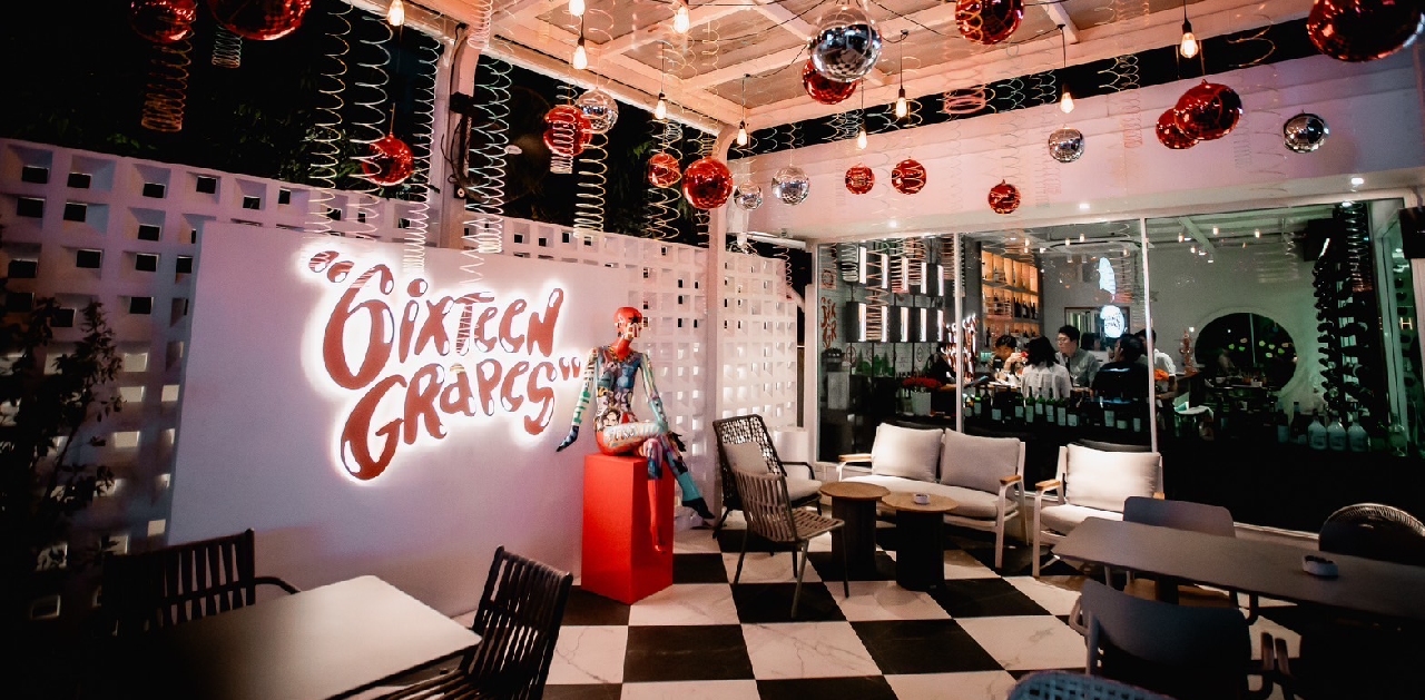 Comically large 2.5-liter glasses of wine are on offer at the new Sixteen Grapes